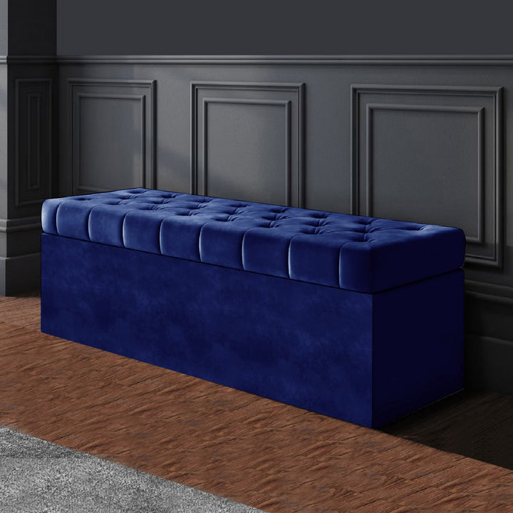 Sapphire velvet Chesterfield upholstered ottoman storage box in plush velvet with matching fabric buttons. Upholstered ottoman storage box or a velvet blanket box, Chesterfield velvet ottoman, Plush velvet storage ottoman, Upholstered ottoman storage box, Velvet storage bench ottoman, Tufted ottoman with storage, High-density foam lid ottoman, Velvet tufted storage bench, Deep storage ottoman velvet, Velvet upholstered bench with storage, Chesterfield storage bench, Ottoman with high-density foam lid, Velve
