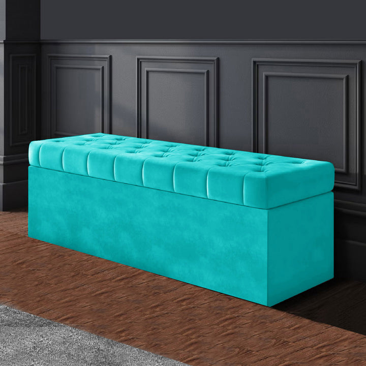 Teal plush velvet Chesterfield upholstered ottoman storage box in plush velvet with matching fabric buttons. Upholstered ottoman storage box or a velvet blanket box, Chesterfield velvet ottoman, Plush velvet storage ottoman, Upholstered ottoman storage box, Velvet storage bench ottoman, Tufted ottoman with storage, High-density foam lid ottoman, Velvet tufted storage bench, Deep storage ottoman velvet, Velvet upholstered bench with storage, Chesterfield storage bench, Ottoman with high-density foam lid, Vel